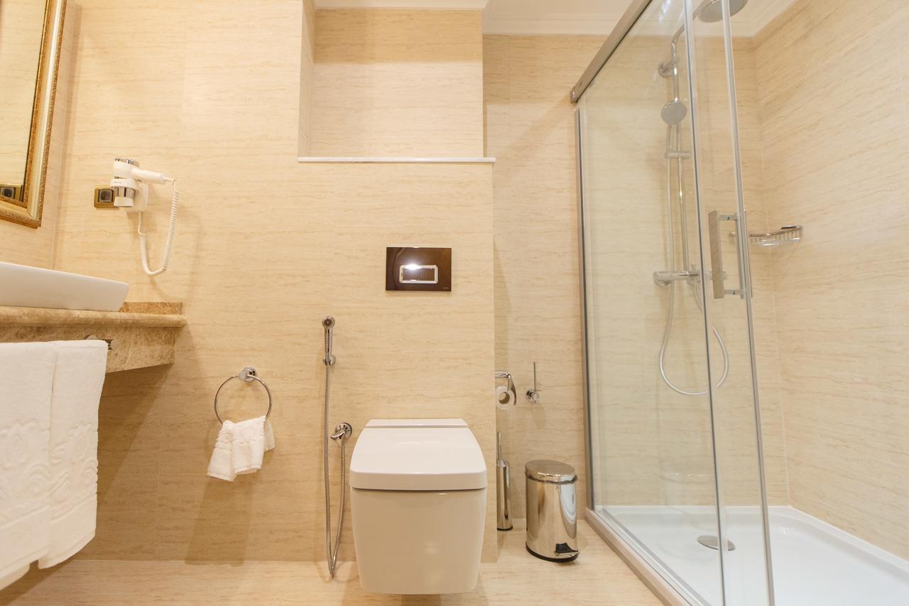 Sultan Palace Hotel Atyrau Exterior photo A modern bathroom